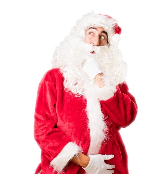 Santa claus denken over iets — Stockfoto