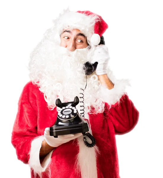 Santa claus com telefone vintage — Fotografia de Stock