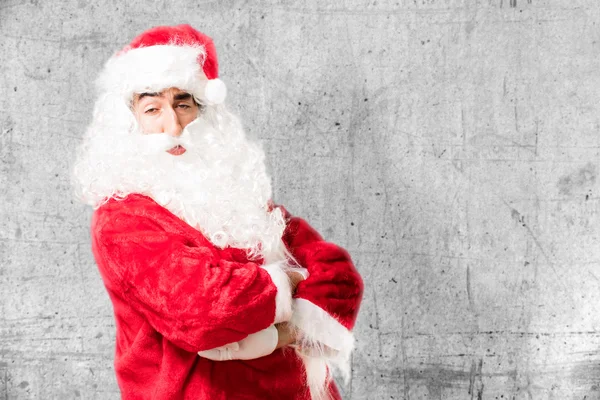 Santa claus in trots poseren — Stockfoto