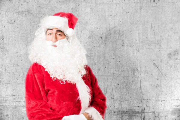 Santa claus in trots poseren — Stockfoto