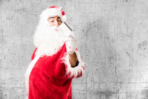 Santa claus bij het opslaan van de bank — Stockfoto