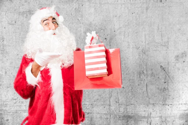 Santa Claus con bolsas de compras — Foto de Stock