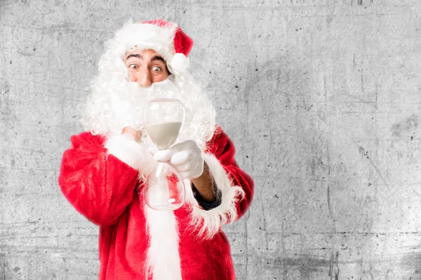 Weihnachtsmann mit Sanduhr — Stockfoto