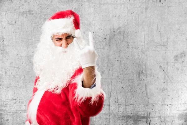 Babbo Natale in posa in disaccordo — Foto Stock