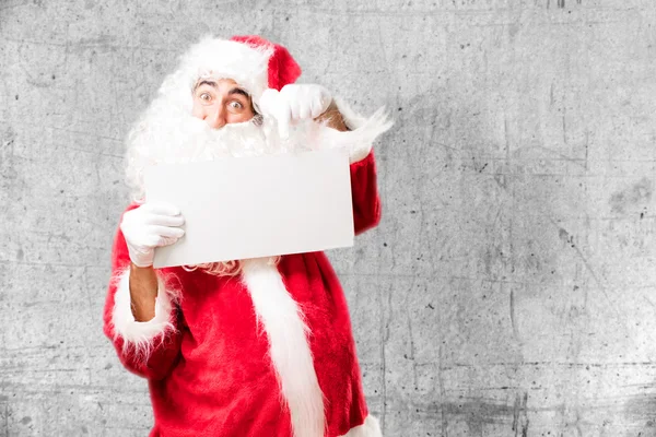 Santa Claus con pancarta — Foto de Stock