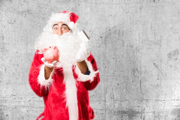 Santa claus com poupança bancária — Fotografia de Stock