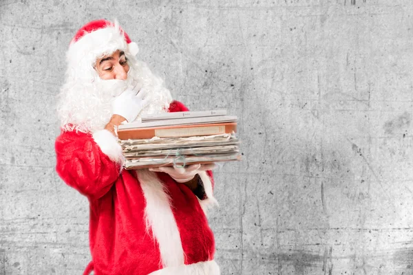 Santa claus with documents — Stock Photo, Image