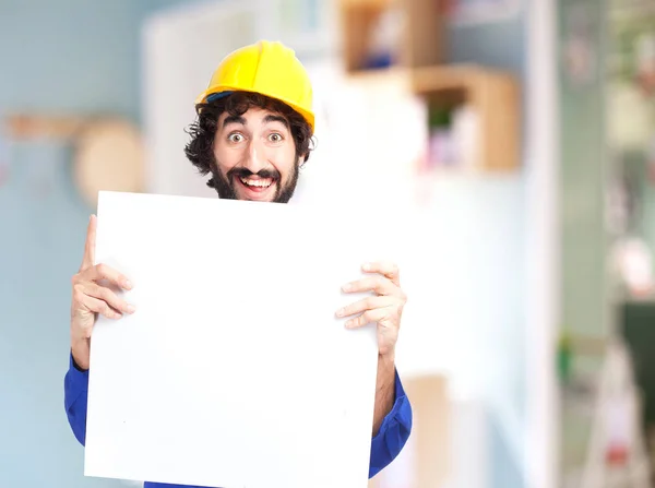 Gelukkig werknemer man met plakkaat — Stockfoto