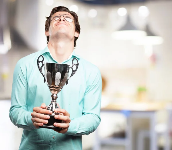 Happy young man with sport cup — Stock Photo, Image