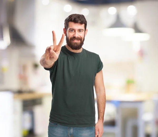 Gelukkig man met nummer twee teken — Stockfoto