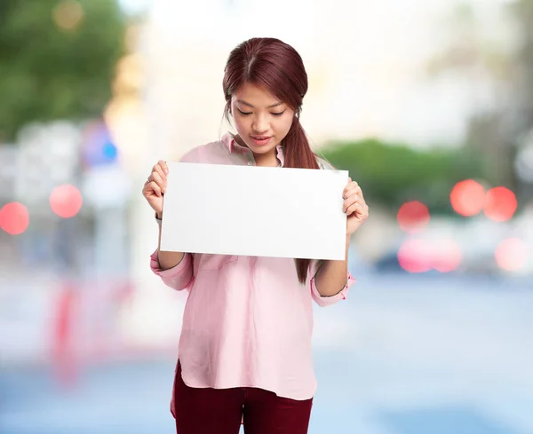 Happy chinese woman with banner — Stock Photo, Image