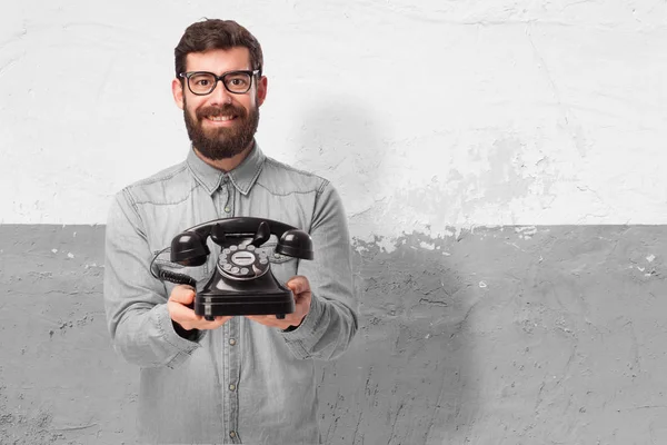 Jovem feliz com telefone — Fotografia de Stock