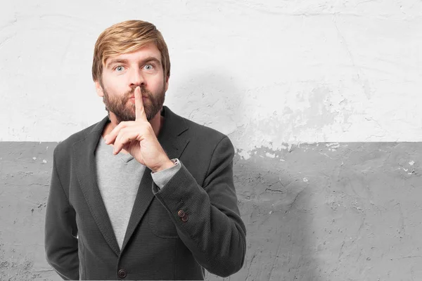 Uomo d'affari arrabbiato con gesto di silenzio — Foto Stock