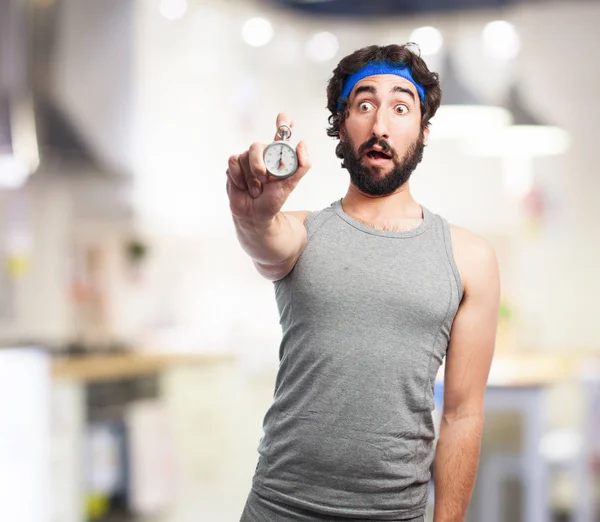 Worried sport man with stopwatch — Stock Photo, Image