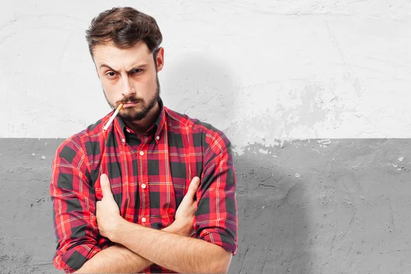 Angry young man s doutníkem — Stock fotografie