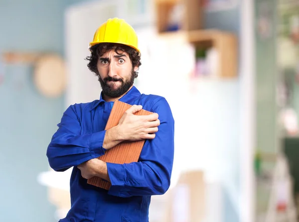 Pracownik zadowolony człowiek z cegły — Zdjęcie stockowe