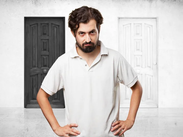 Angry young man cross wapens — Stockfoto