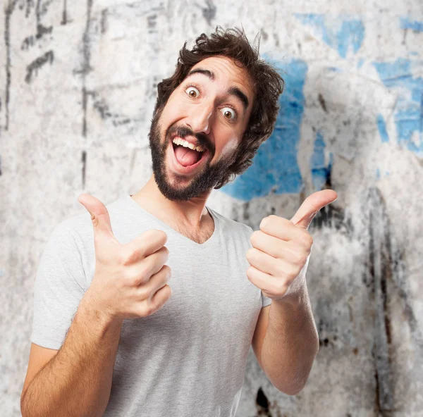 Joven feliz con signo de bien — Foto de Stock