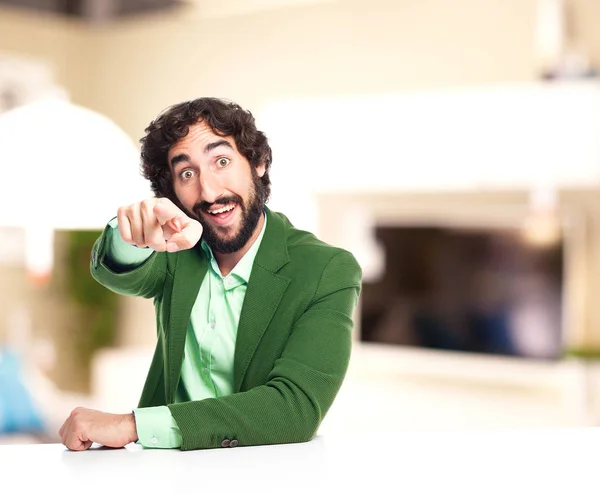 Surprised businessman pointing front — Stock Photo, Image