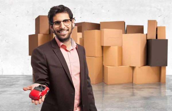 Happy businessman with red car — Stock Photo, Image