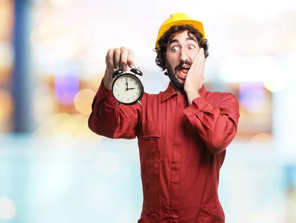 Preoccupato lavoratore uomo con orologio — Foto Stock