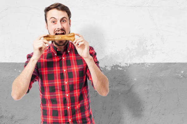 Joven feliz con hueso — Foto de Stock