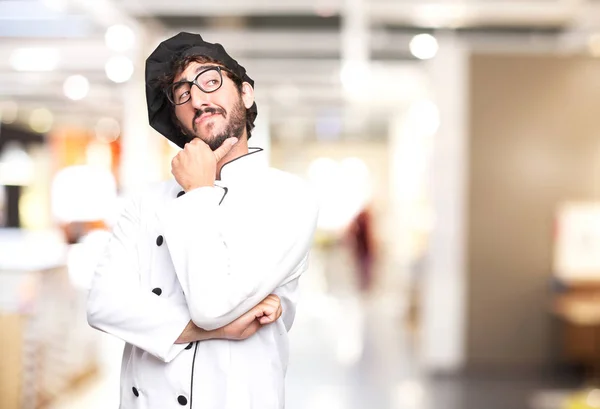 Cozinheiro feliz homem pensando — Fotografia de Stock