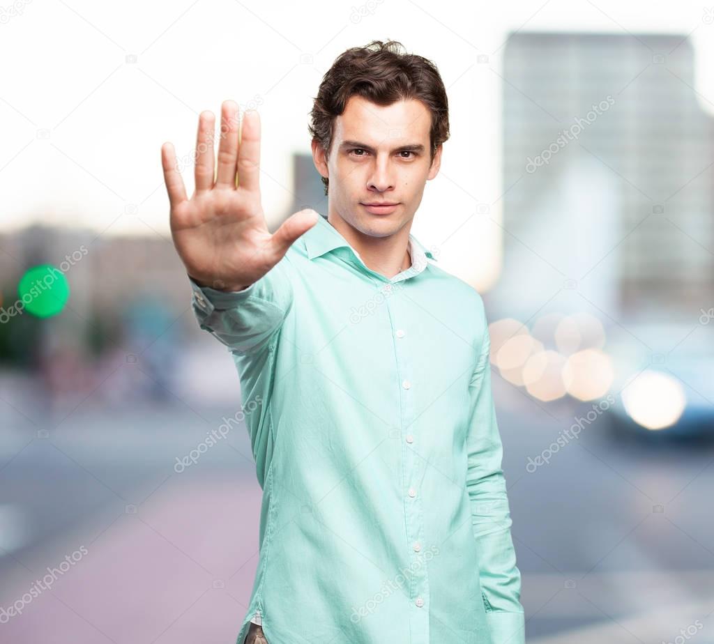 crazy young man with stop gesture