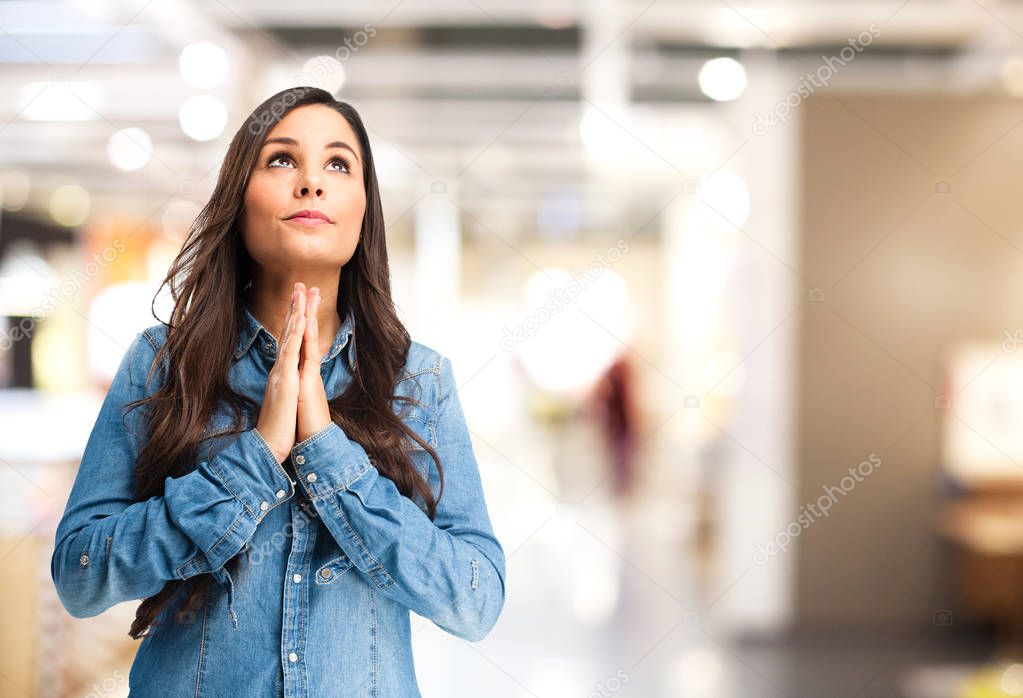 happy young woman praying