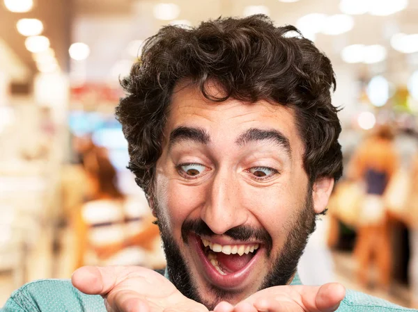 Crazy young man showing gesture — Stock Photo, Image