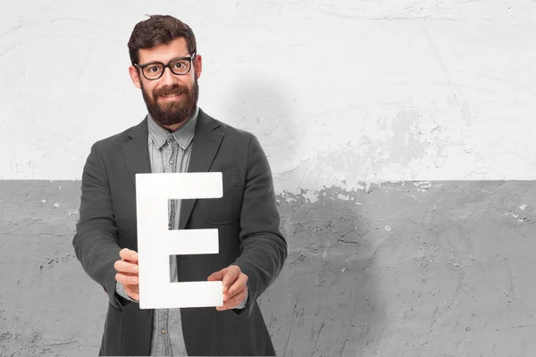 Hombre feliz con letra E —  Fotos de Stock