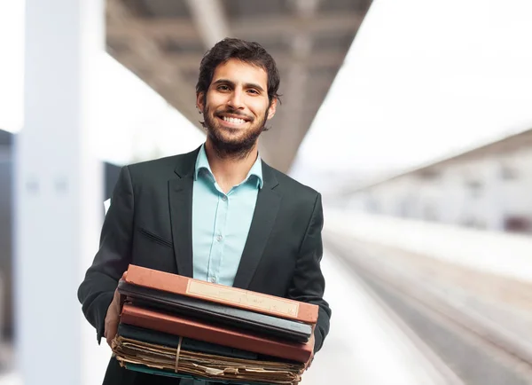 Hombre de negocios feliz con archivos — Foto de Stock