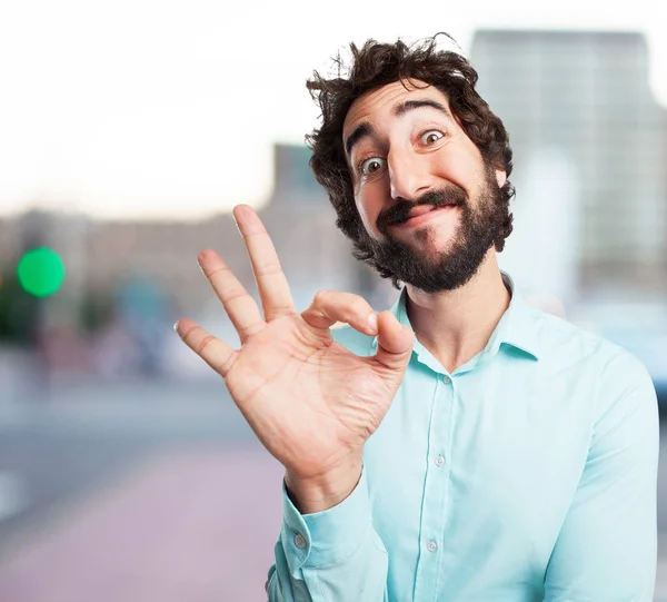 Verrückter junger Mann mit Alarmzeichen — Stockfoto