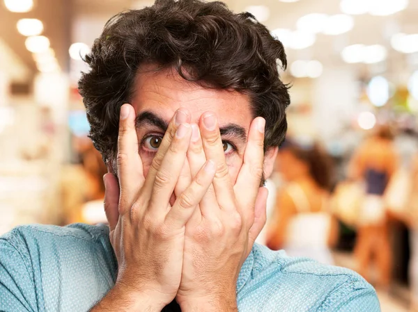 Crazy young man in scared pose — Stock Photo, Image