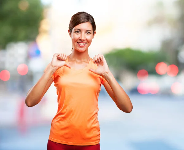 Proud sport woman in celebrating pose — Stock Photo, Image