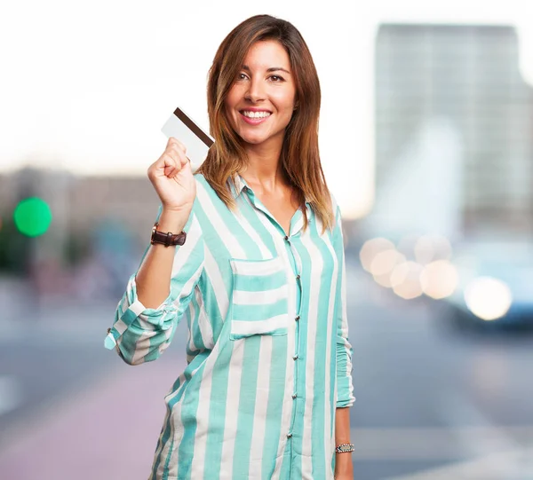 Happy young woman with credit card — Stock Photo, Image