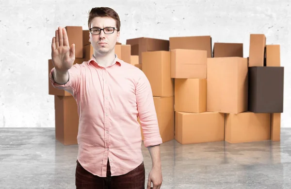 Angry young man with stop gesture — Stock Photo, Image