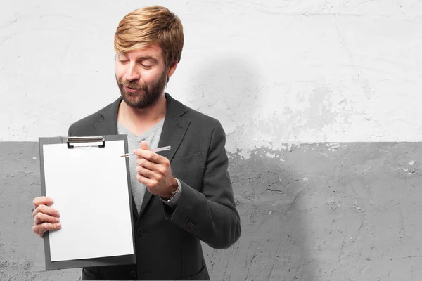 Zufriedener Geschäftsmann mit Notizbuch — Stockfoto