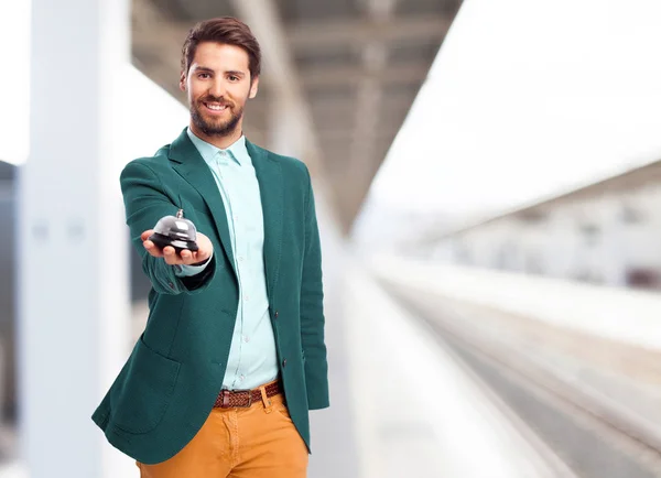 happy businessman with ring bell