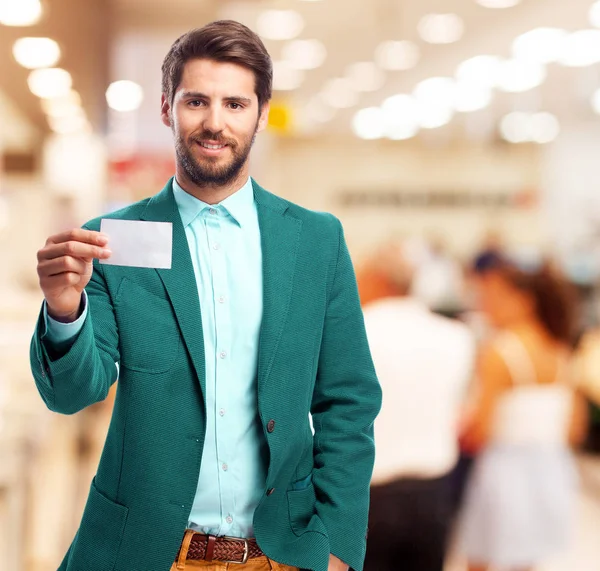 Happy businessman with visit card — Stock Photo, Image