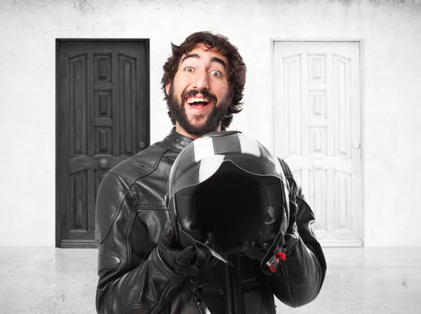 Happy biker with motorcycle helmet — Stock Photo, Image