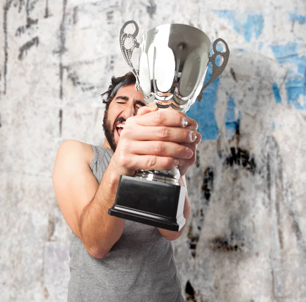 Proud young man with sport cup — Stock Photo, Image