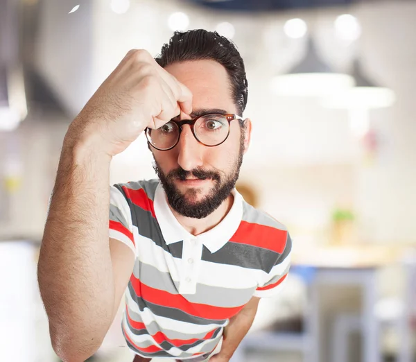 Crazy young man with worried expression — Stock Photo, Image