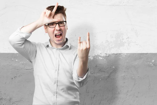 Angry young man met verliezer teken — Stockfoto