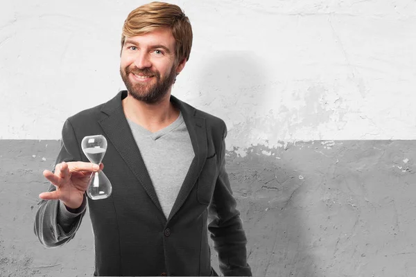 Zufriedener Geschäftsmann mit Sanduhr — Stockfoto