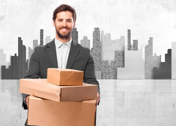 Hombre de negocios feliz con cajas —  Fotos de Stock