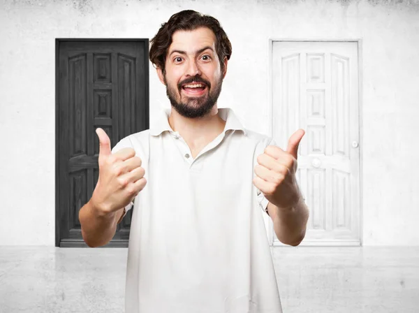 Happy young man with okay sign — Stock Photo, Image