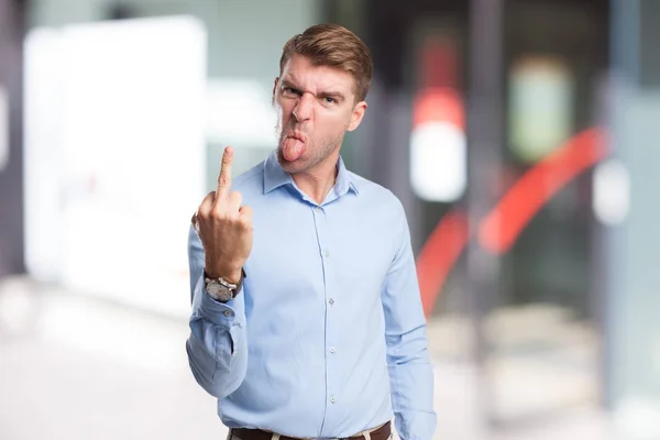Homem de negócios zangado com sinal de discordar — Fotografia de Stock
