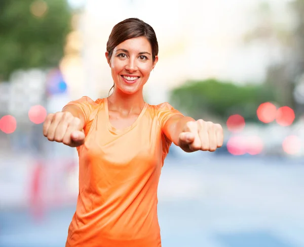 Strong sport woman with fist sign — Stock Photo, Image