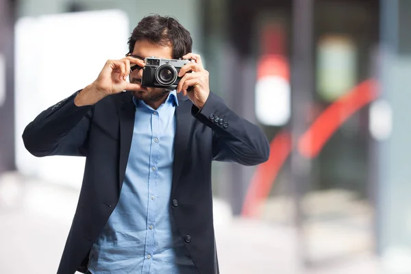 Indian businessman taking a picture — Stock Photo, Image